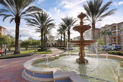 Fountain and palm trees at Vista Cay Resort in Orlando, Florida