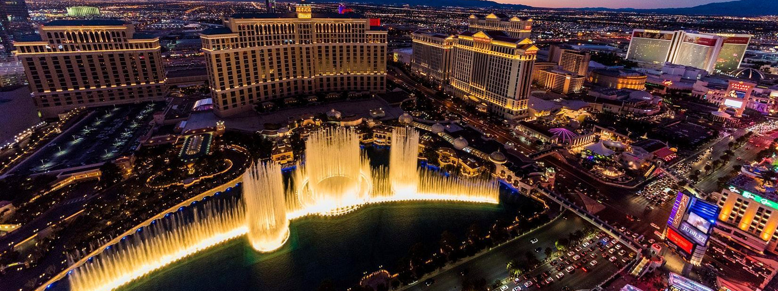 Las Vegas Strip and Bellagio fountains at dusk