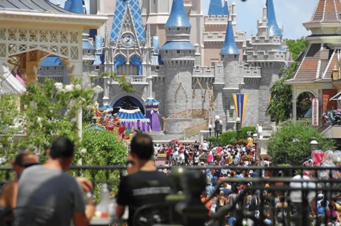 Theme park castle and visitors in Orlando, Florida